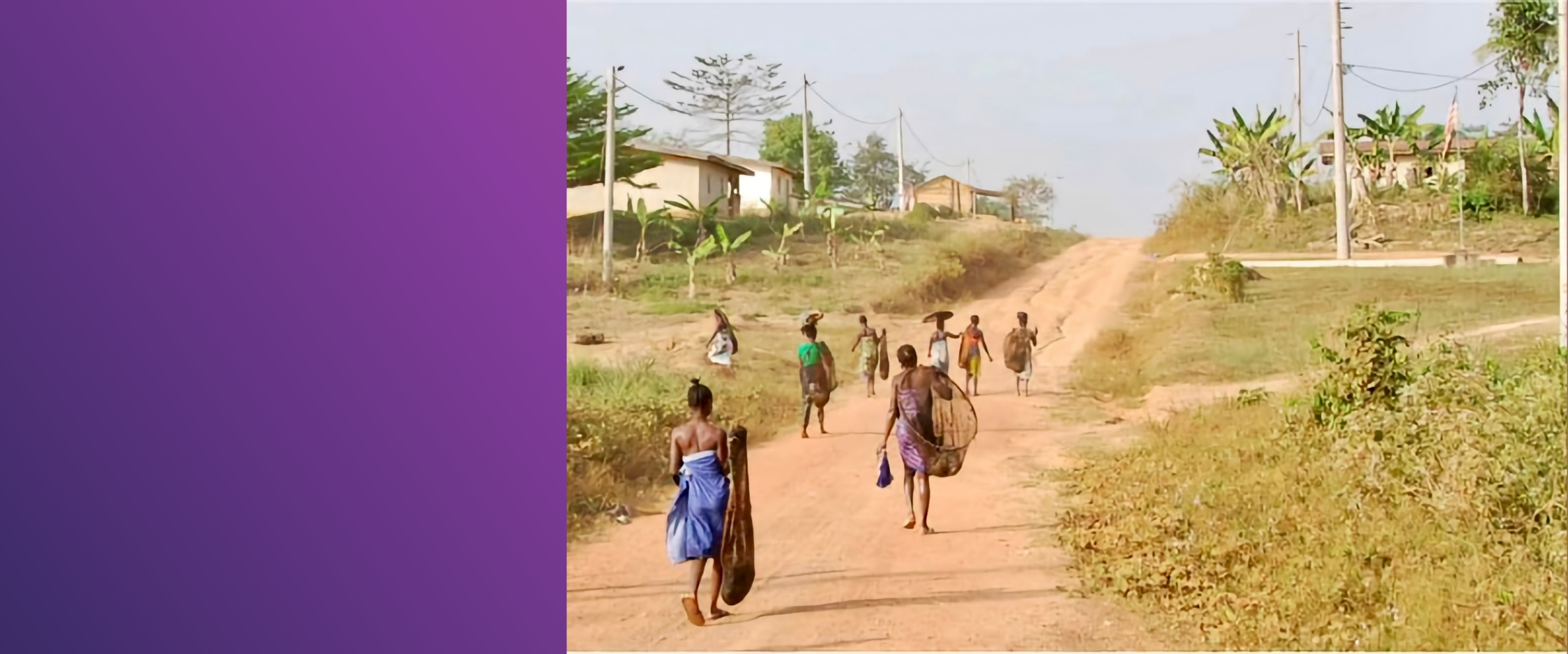 women and children walking on a road in liberia